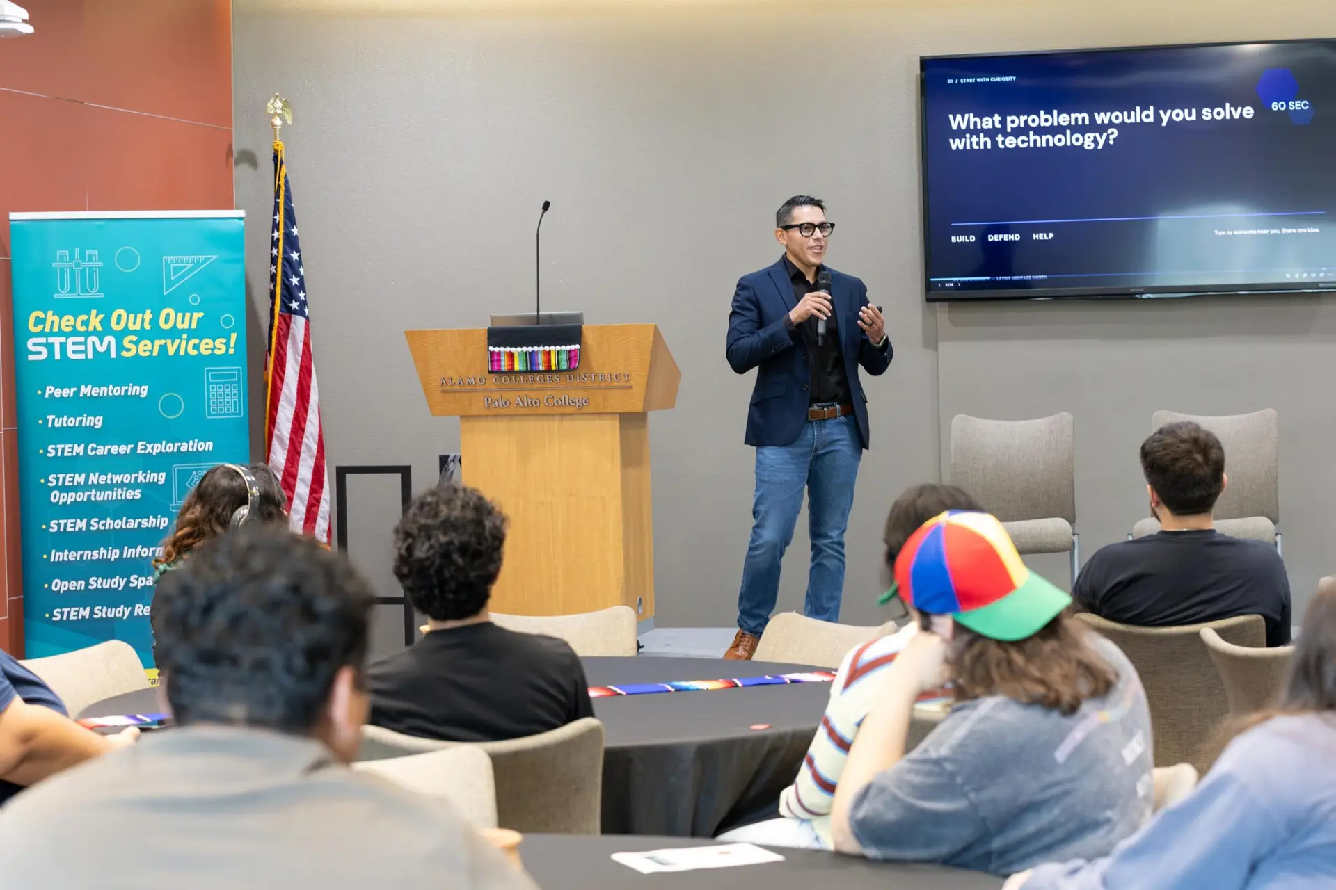 Robert Maldonado of We Can Change IT speaking to students at Palo Alto College about solving problems with technology.